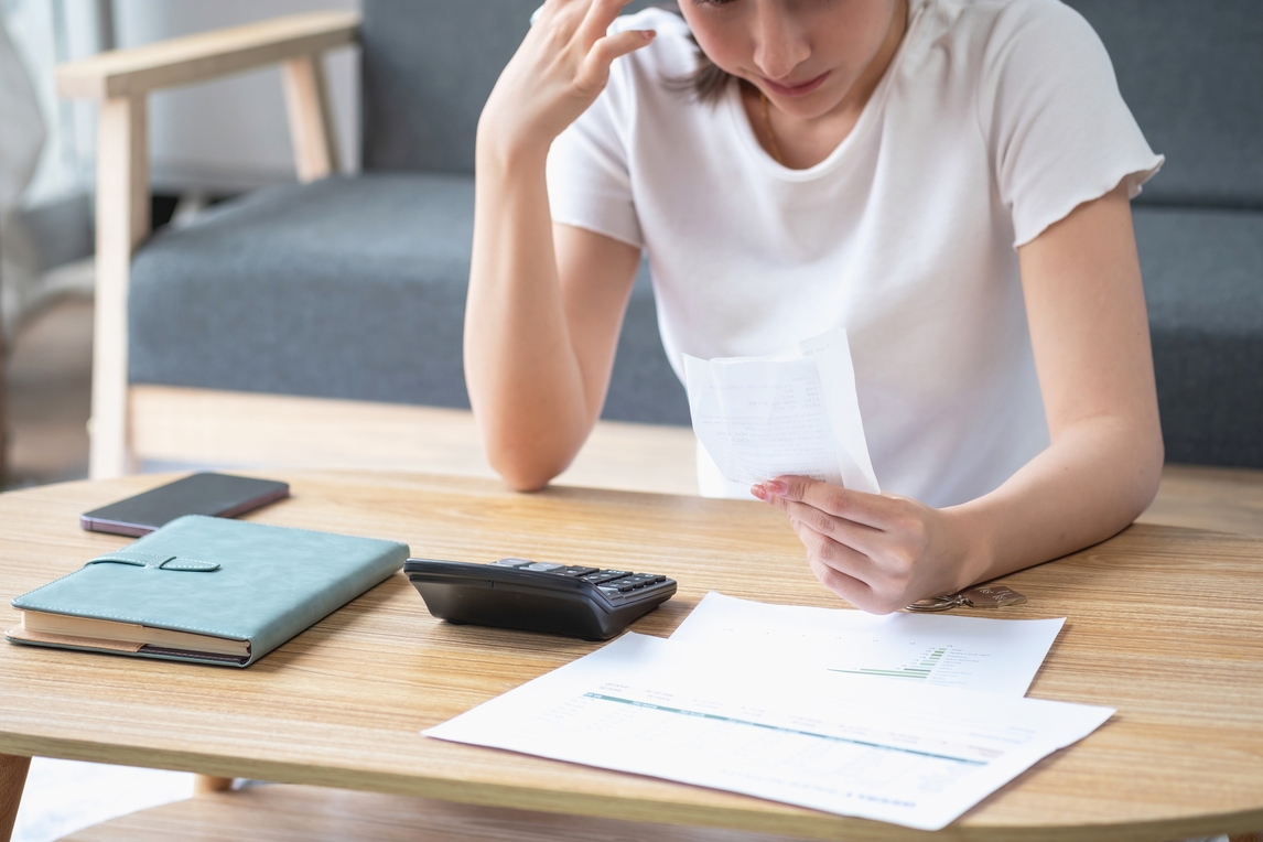 woman examining papers 