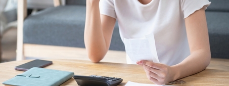woman examining papers 