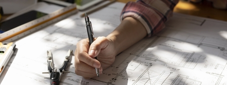 architect drawing floor plans 